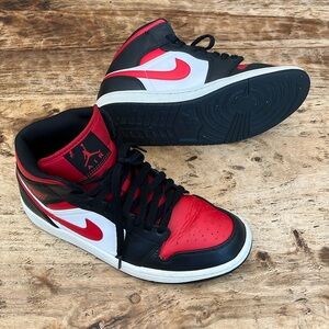 Red and black Air Jordan’s size 8